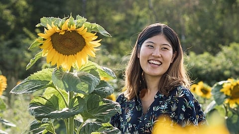 woman with sunflower